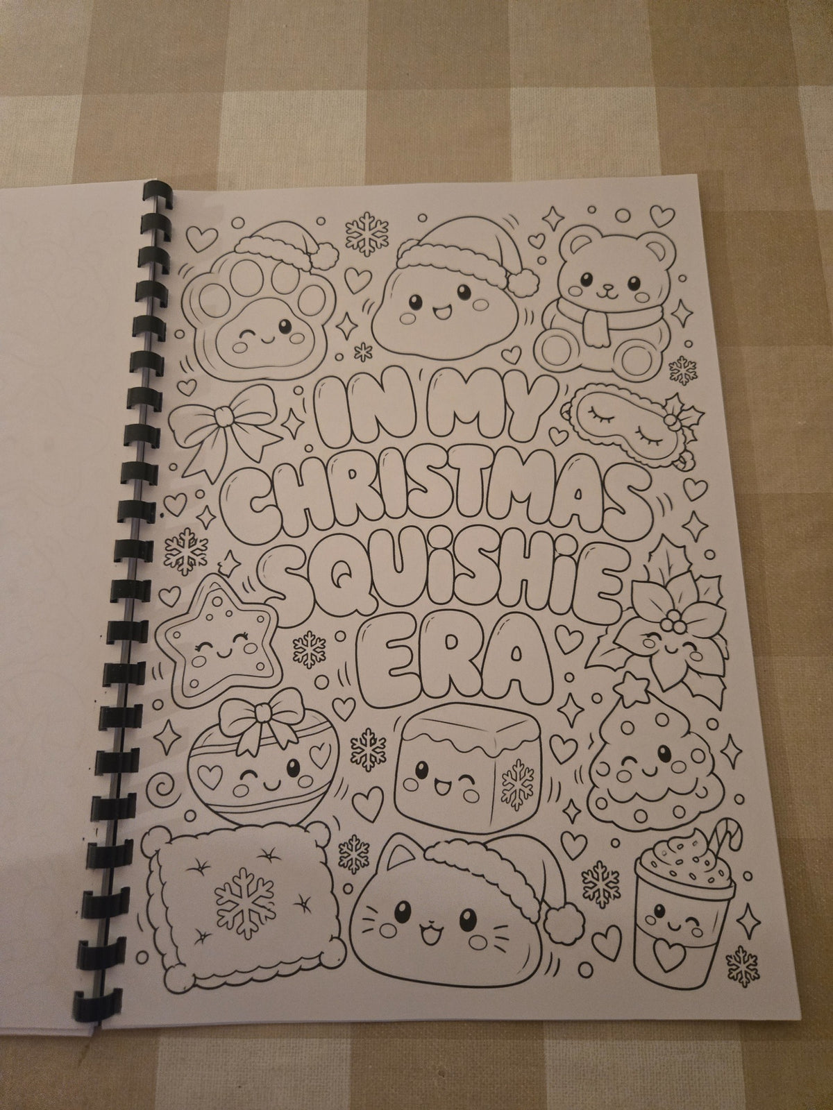 Christmas Squishie colouring book title page with cute festive squishies
