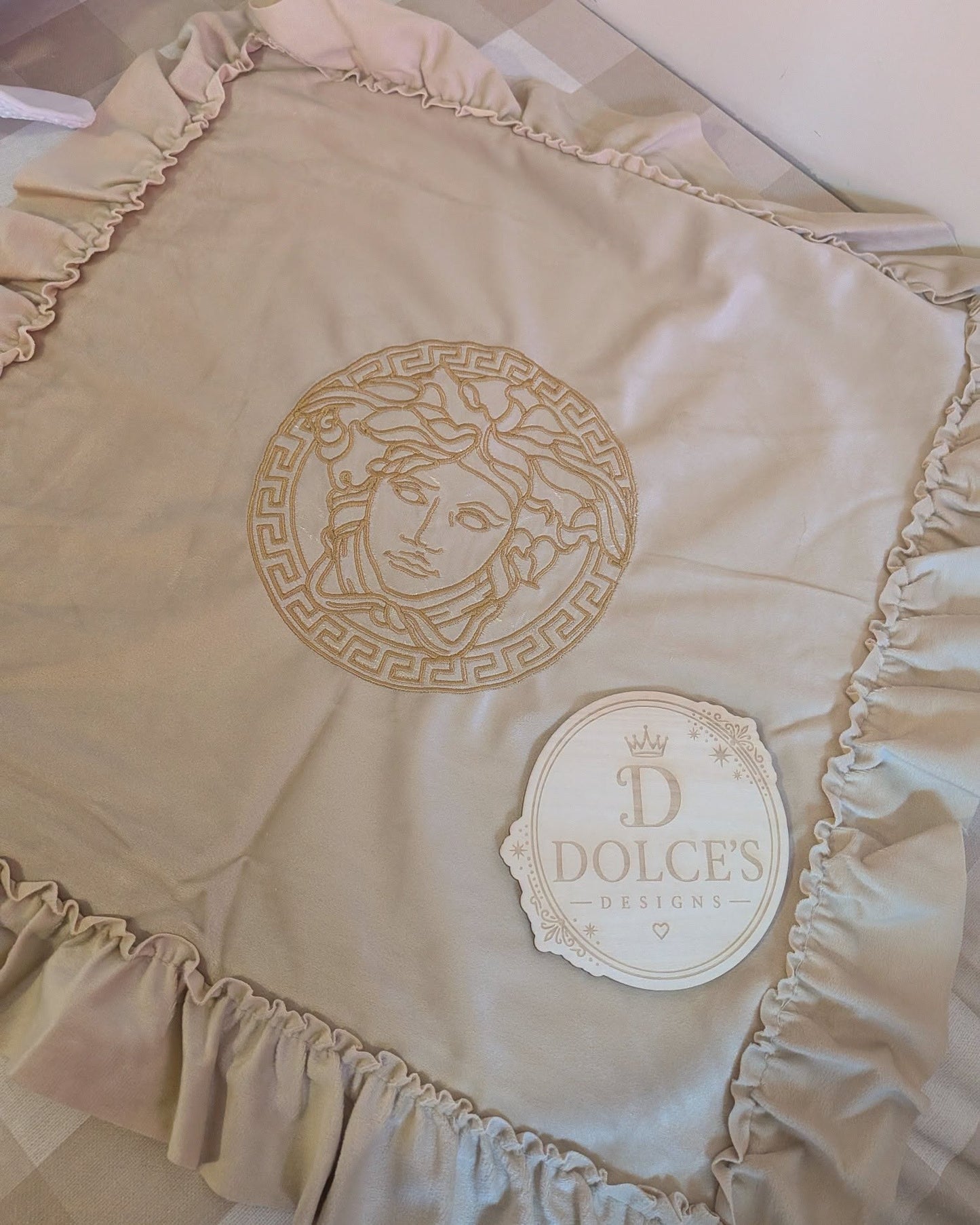 Luxury Gold Emblem Ruffle Cushion Cover – Neutral Embroidered Design