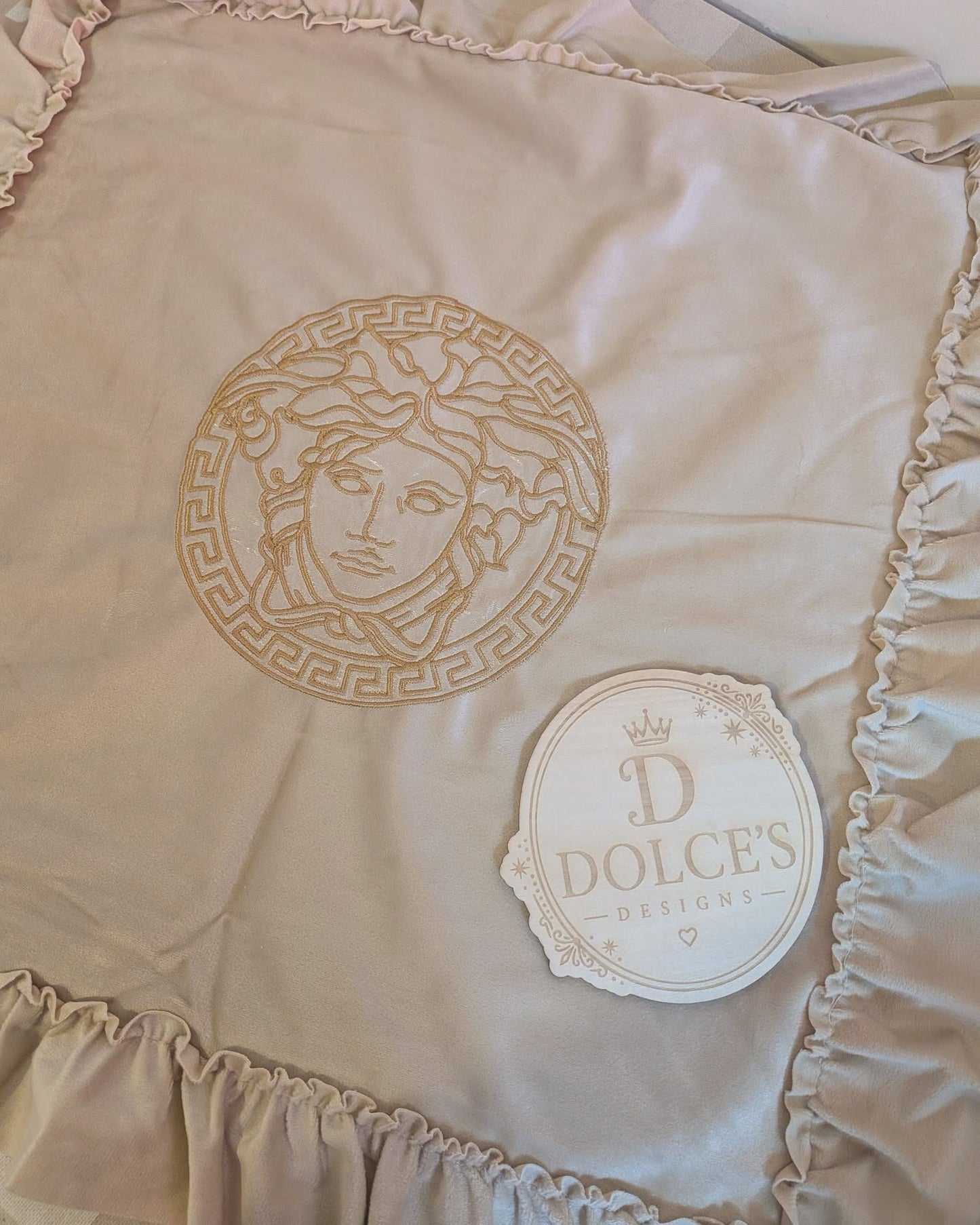 Luxury Gold Emblem Ruffle Cushion Cover – Neutral Embroidered Design